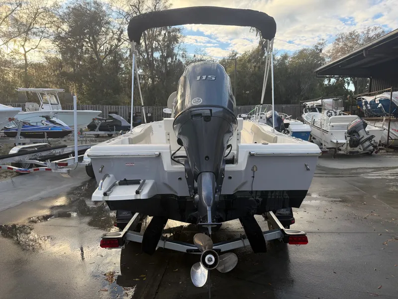 Slide: The Image of Rear view of a 2024 Key West 179 FS boat outdoors. - 3