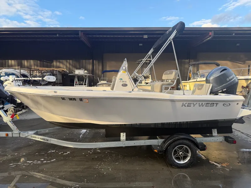 Slide: The Image of 2024 Key West 179 FS boat on trailer outdoors. - 4
