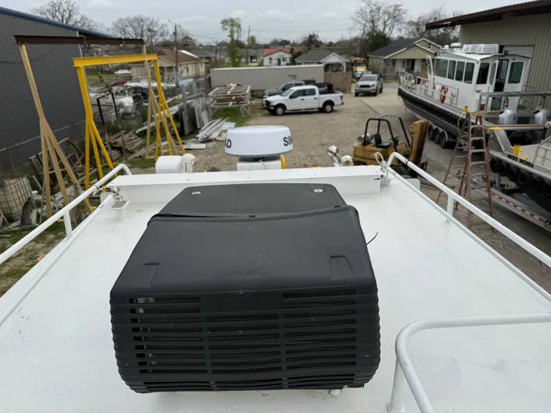 Slide: The Image of Custom Commercial Aluminum 34x10 Deck Boat 2010 - 4