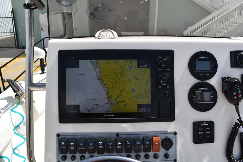Slide: The Image of Dashboard of 2022 Key West 219 FS boat with Garmin navigation system. - 17