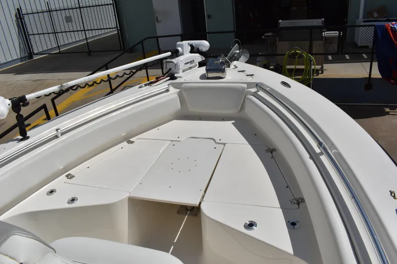 Slide: The Image of 2022 Key West 219 FS boat deck with seating and fishing equipment. - 27