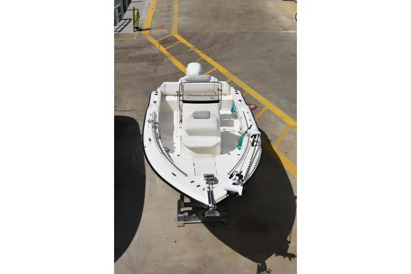 Slide: The Image of 2022 Key West 219 FS boat on a concrete surface, viewed from above. - 45