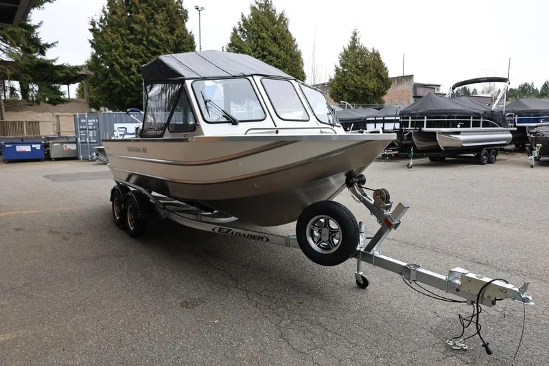 Slide: The Image of 2026 Thunder Jet 200 Luxor boat on trailer in outdoor setting. - 10