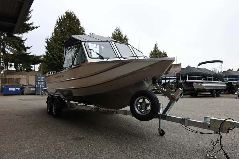 Slide: The Image of 2026 Thunder Jet 200 Luxor boat on trailer in outdoor setting. - 11