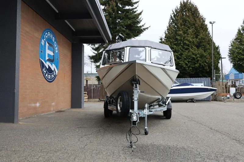 Slide: The Image of 2026 Thunder Jet 200 Luxor boat on trailer at Bjornson Marine dealership. - 13