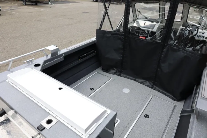 Slide: The Image of 2026 Thunder Jet 200 Luxor boat interior with spacious deck and modern controls. - 17