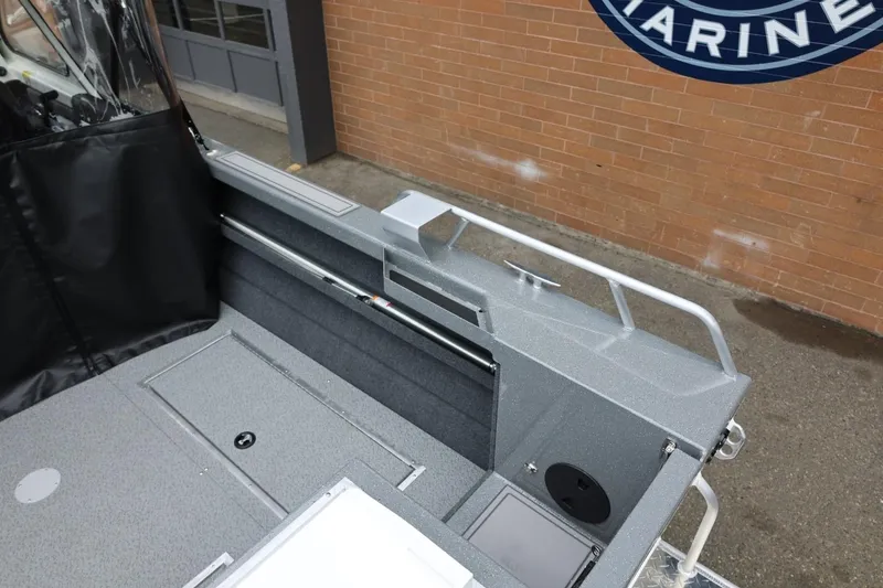 Slide: The Image of 2026 Thunder Jet 200 Luxor boat interior with sleek design and storage compartments. - 18