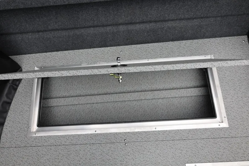 Slide: The Image of Open storage compartment in 2026 Thunder Jet 200 Luxor boat interior. - 24