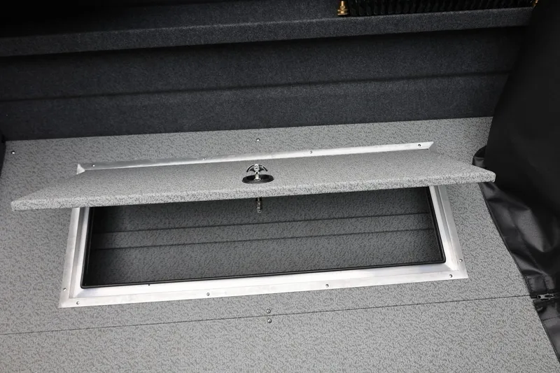 Slide: The Image of Open storage compartment in 2026 Thunder Jet 200 Luxor boat interior. - 26