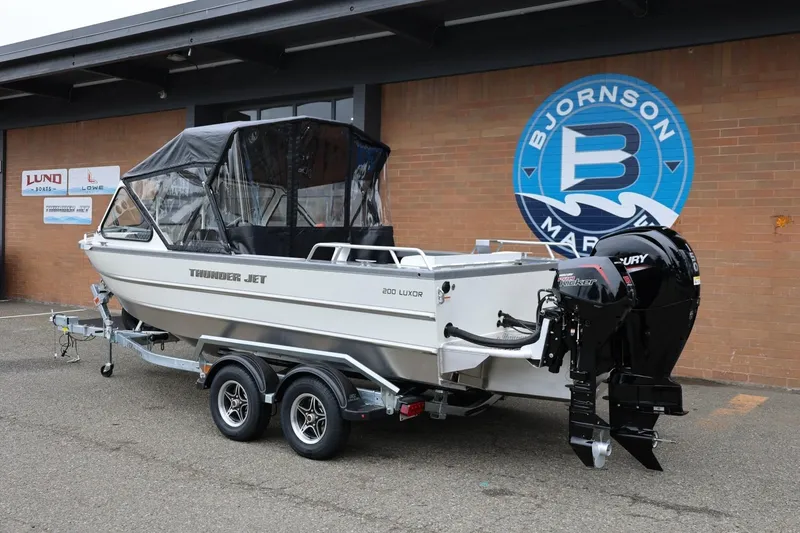 Slide: The Image of 2026 Thunder Jet 200 Luxor boat on trailer at Bjornson Marine dealership. - 3