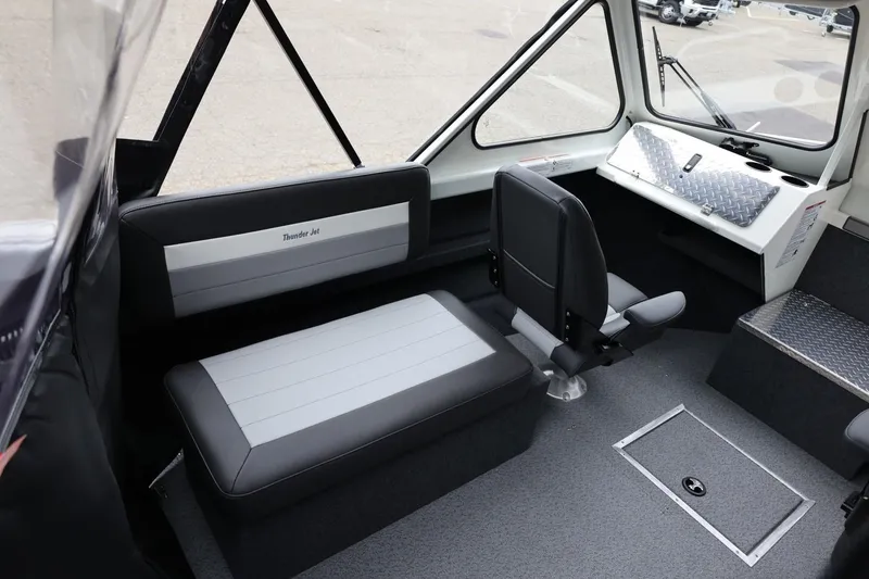 Slide: The Image of Interior of 2026 Thunder Jet 200 Luxor boat with seating and control panel. - 30