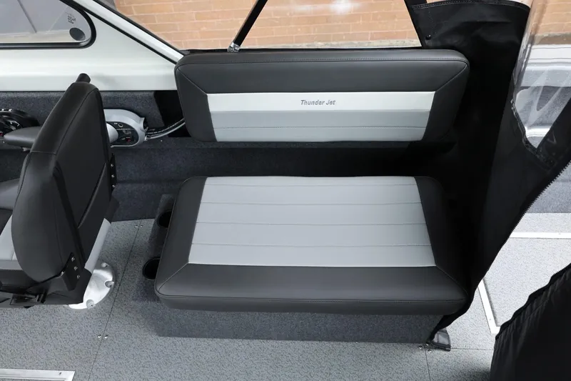 Slide: The Image of Interior seating of 2026 Thunder Jet 200 Luxor boat, featuring sleek gray upholstery. - 31