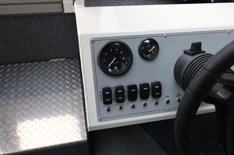 Slide: The Image of Control panel of 2026 Thunder Jet 200 Luxor boat with gauges and switches. - 39