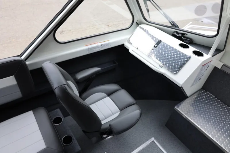 Slide: The Image of Interior of 2026 Thunder Jet 200 Luxor boat with modern seating and dashboard. - 41