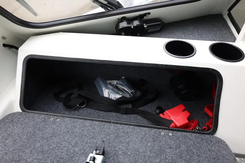 Slide: The Image of Storage compartment in 2026 Thunder Jet 200 Luxor boat with accessories and cup holders. - 44