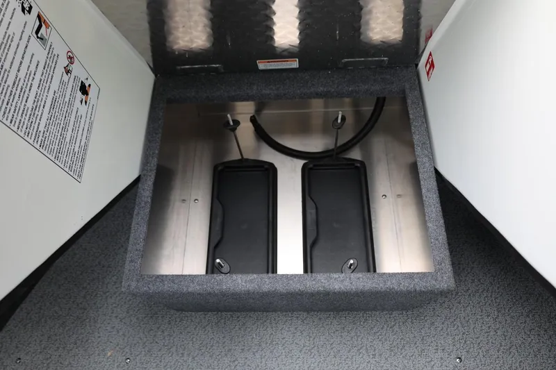 Slide: The Image of Battery compartment of 2026 Thunder Jet 200 Luxor boat, featuring dual battery setup. - 46