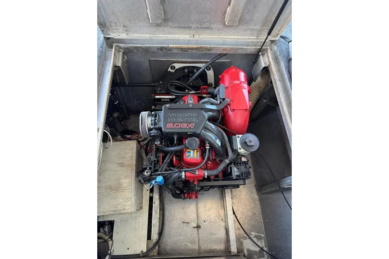Slide: The Image of Engine compartment of a 1987 Stardust Cruisers 14 x 54 houseboat, featuring a Volvo Penta 8.0 GXI engine. - 41