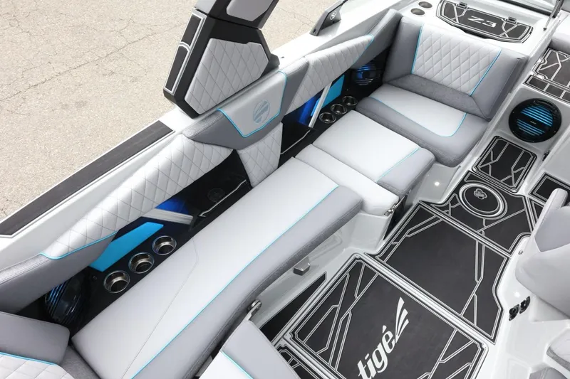 Slide: The Image of 2026 Tigé Z3 boat interior with sleek seating, modern design, and stylish flooring. - 16