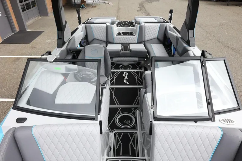 Slide: The Image of 2026 Tigé Z3 boat interior with luxurious seating and modern design. - 21