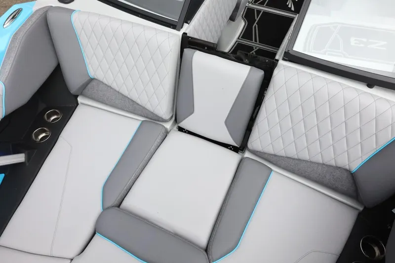 Slide: The Image of 2026 Tigé Z3 boat interior with gray and white quilted seating. - 22