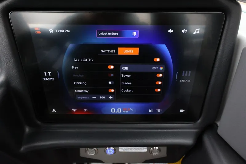 Slide: The Image of Touchscreen control panel in a 2026 Tigé Z3 boat, displaying lighting and ballast settings. - 29