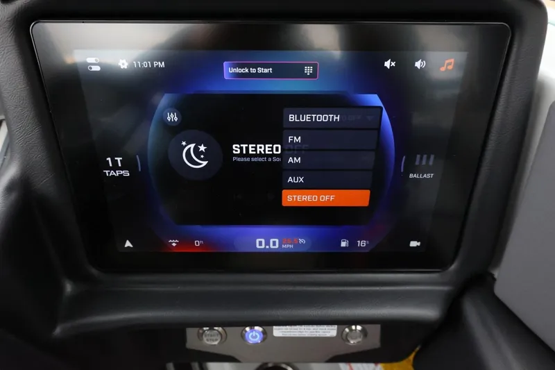 Slide: The Image of Touchscreen display in 2026 Tigé Z3 boat showing stereo and Bluetooth options. - 31
