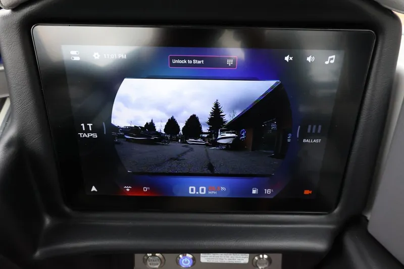Slide: The Image of 2026 Tigé Z3 dashboard display showing rearview camera and control settings. - 32