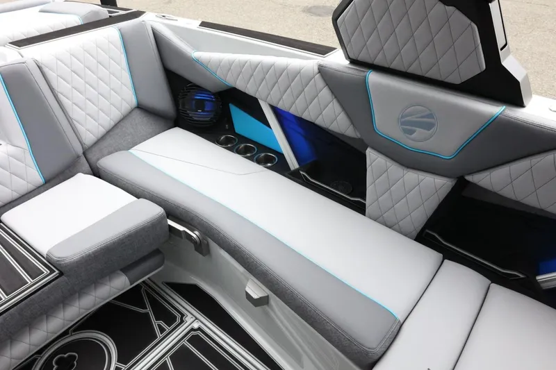 Slide: The Image of 2026 Tigé Z3 boat interior with modern, quilted upholstery and sleek design elements. - 39