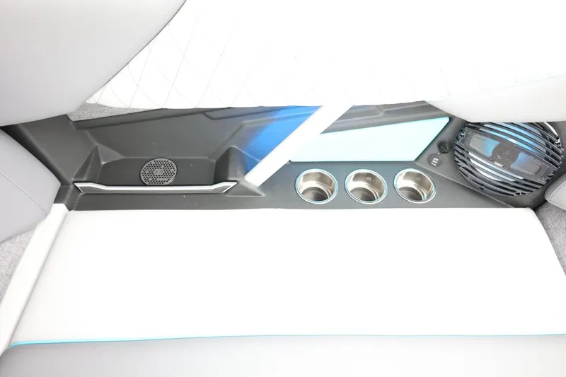 Slide: The Image of Interior of 2026 Tigé Z3 boat featuring cup holders and speaker system. - 43