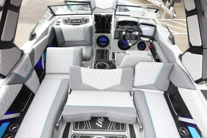 Slide: The Image of 2026 Tigé Z3 boat interior with modern seating and advanced dashboard features. - 46