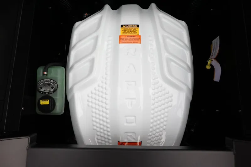 Slide: The Image of Engine compartment of 2026 Tigé Z3 boat featuring Raptor engine cover. - 53