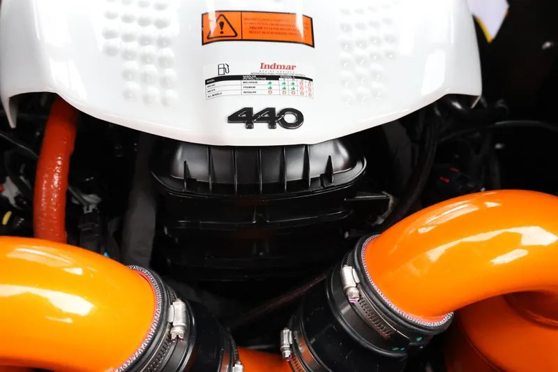 Slide: The Image of Engine of 2026 Tigé Z3 boat with Indmar 440 horsepower, featuring orange hoses. - 54