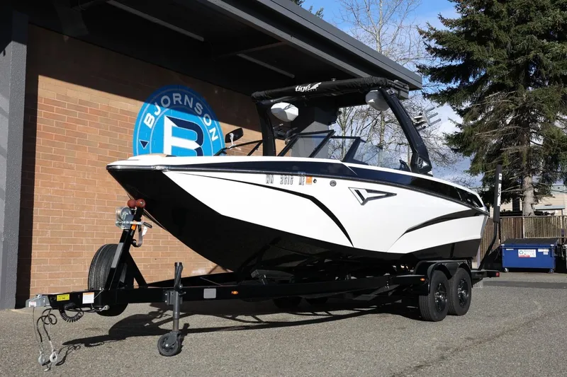 Slide: The Image of 2023 Tigé Z3 boat on trailer outside Bjornson building. - 15