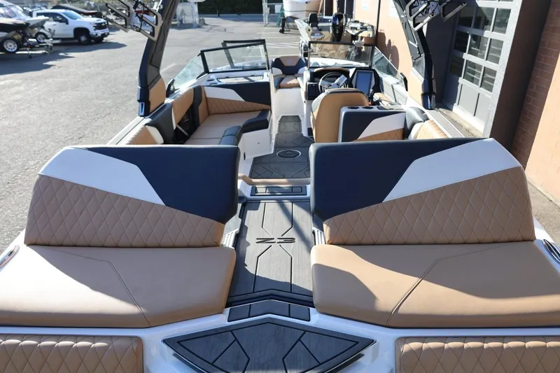 Slide: The Image of 2023 Tigé Z3 boat interior with luxurious seating and modern design. - 20