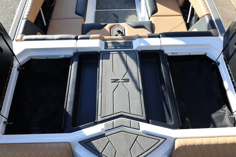Slide: The Image of 2023 Tigé Z3 boat interior with sleek seating and storage compartments. - 21