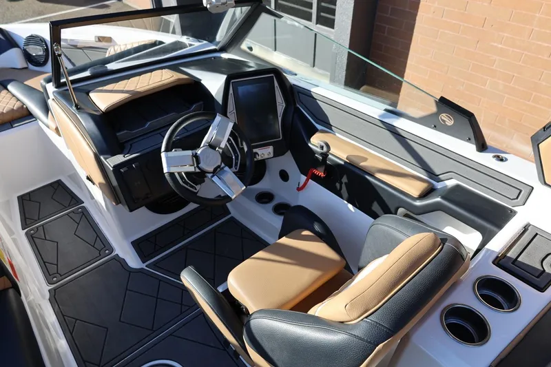 Slide: The Image of 2023 Tigé Z3 boat interior with modern dashboard and steering wheel design. - 31