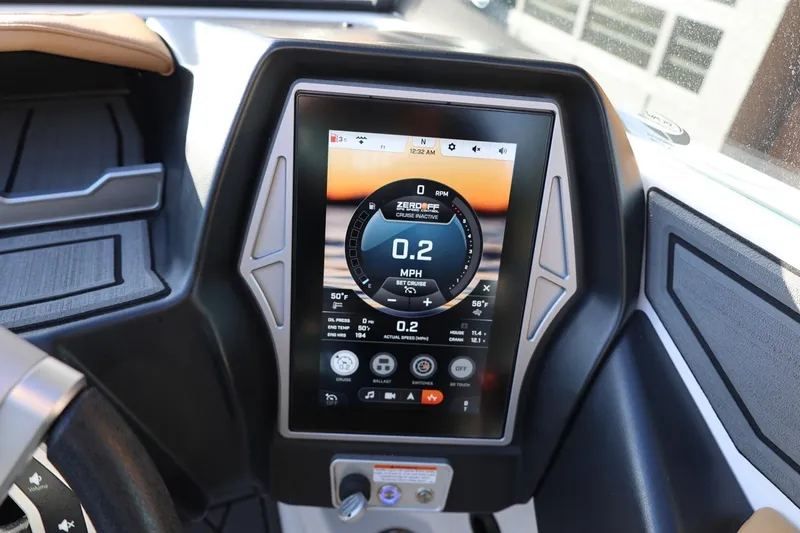Slide: The Image of Touchscreen dashboard of 2023 Tigé Z3 boat displaying speed and controls. - 35