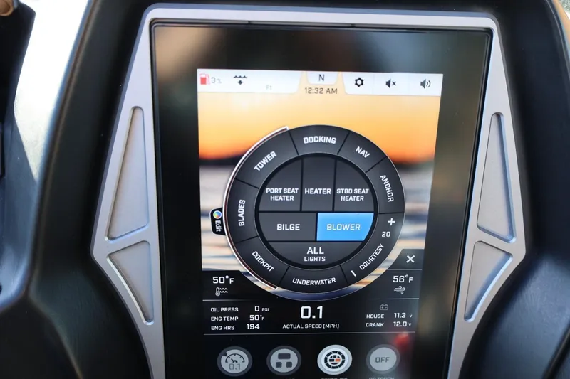 Slide: The Image of 2023 Tigé Z3 touchscreen control panel displaying various boat functions and settings. - 37