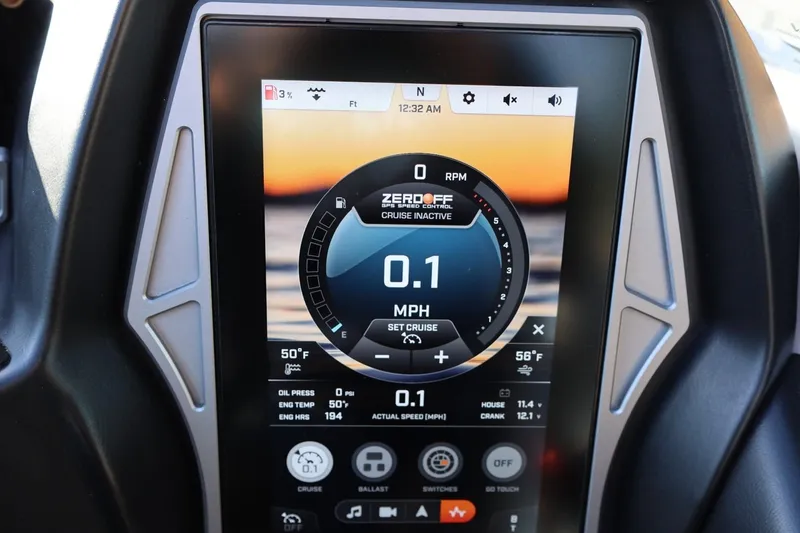 Slide: The Image of 2023 Tigé Z3 boat dashboard display showing speed and control settings. - 39