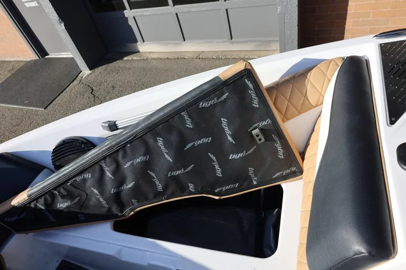 Slide: The Image of 2023 Tigé Z3 boat interior with custom upholstery and branded cover. - 48