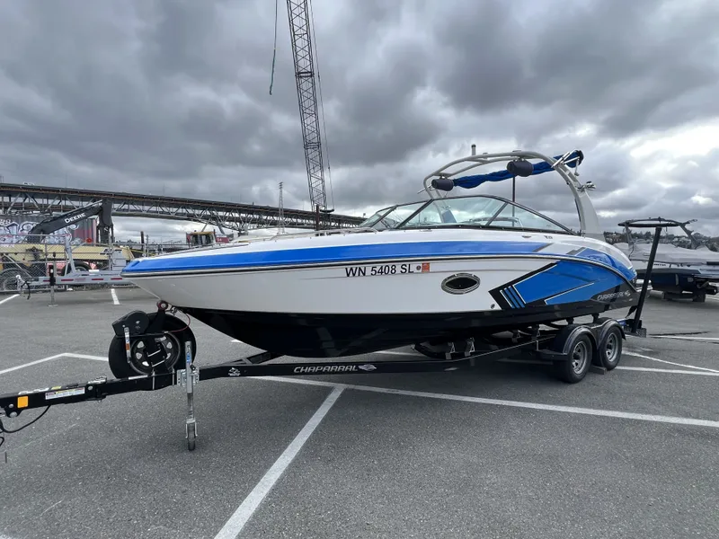 The Image of 2017 Chaparral Vortex 2430 VRX boat on trailer outdoors. - 1
