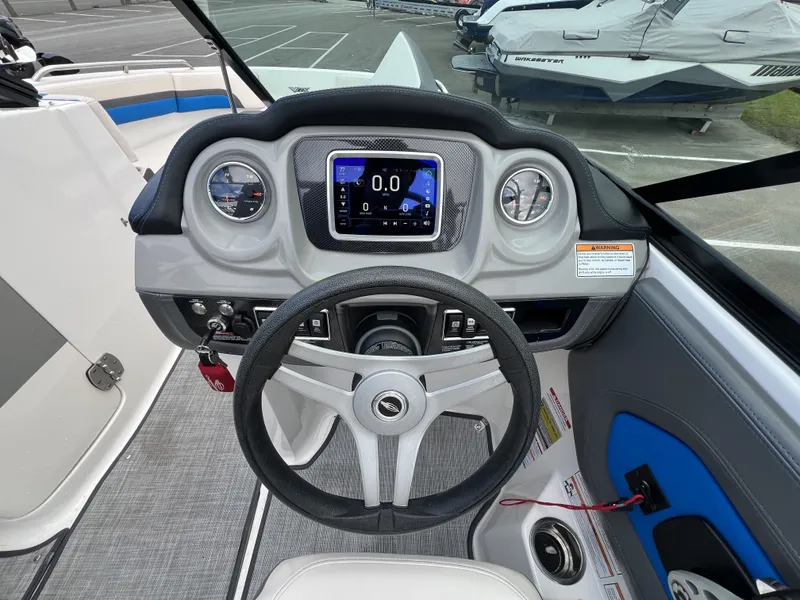 Slide: The Image of Dashboard of 2017 Chaparral Vortex 2430 VRX with steering wheel and instruments. - 12