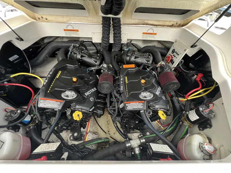 Slide: The Image of Engine compartment of 2017 Chaparral Vortex 2430 VRX with Rotax engines. - 17