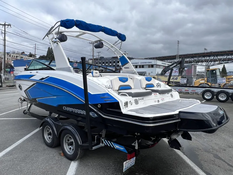 Slide: The Image of 2017 Chaparral Vortex 2430 VRX boat parked on trailer outdoors. - 3