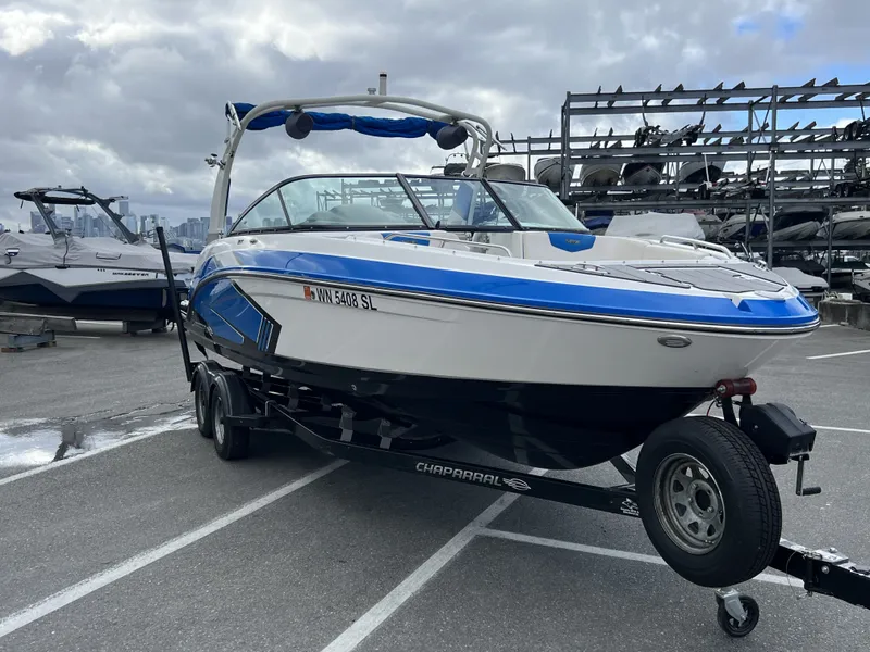 Slide: The Image of 2017 Chaparral Vortex 2430 VRX boat on trailer at marina. - 7