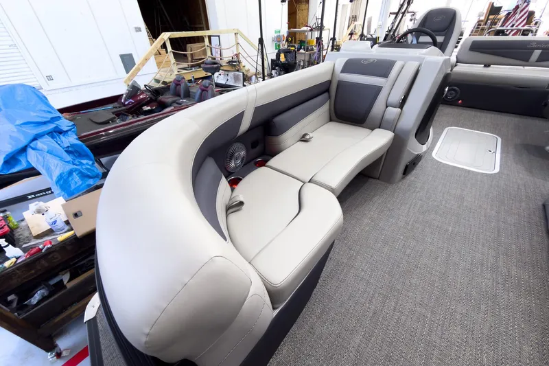 Slide: The Image of 2025 Barletta Cabrio 22UC boat interior with plush seating and modern design. - 10