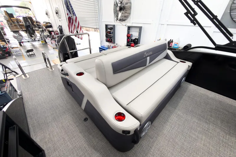Slide: The Image of 2025 Barletta Cabrio 22UC boat interior with plush seating and modern design. - 24