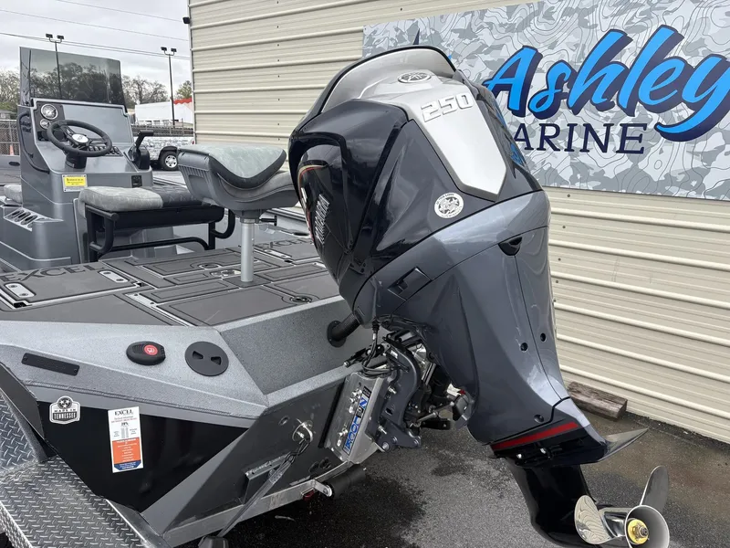 Slide: The Image of Excel 230 Bay Pro 2026 with powerful outboard motor. - 3