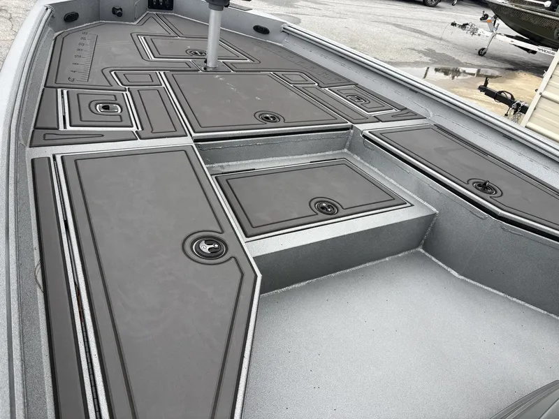 Slide: The Image of Deck of Excel 230 Bay Pro boat, model 2026. - 7