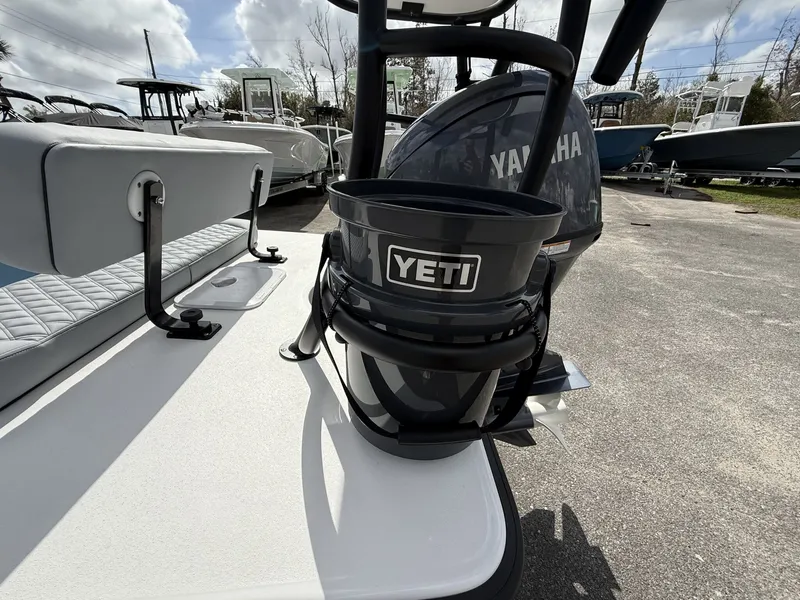 Slide: The Image of Delta Boatworks D18 CC 2026 with Yeti gear and Yamaha motor. - 4